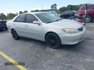 2005 Toyota Camry LE with VIN 4T1BE30K35U572110, listed as a IAAI auction lot 42674324 with 147,480 mi miles and . Bid and sale history available at DreamBid. Image 1.