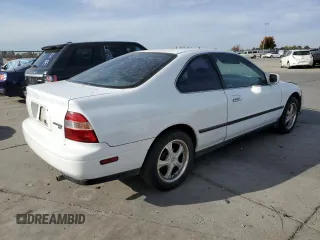 1994 Honda Accord LX with VIN 1HGCD7239RA023822, listed as a Copart auction lot 77522983 with 244,934 mi miles and Salvage Title. Bid and sale history available at carsss.com. Image 3.