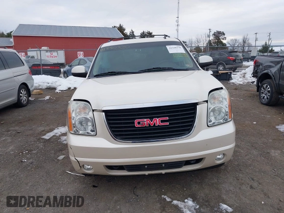2012 GMC Yukon XL SLT with VIN 1GKS2KE79CR252581, listed as a IAAI auction lot 41330370 with 158,736 mi miles. Bid and sale history available at carsss.com. Image 12.