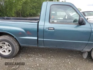 1999 Mazda B-Series Truck SX z VIN 4F4YR12CXXTM22296, wystawiony jako Copart lot #57175325 z przebiegiem 129 333 mil mil oraz Szkody całkowita. Historia ofert i sprzedaży dostępna na DreamBid. Obrazek 10.