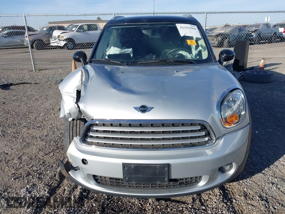 2012 MINI Countryman with VIN WMWZB3C59CWM05749, listed as a IAAI auction lot 38329304 with 64,590 mi miles and . Bid and sale history available at DreamBid. Image 12.