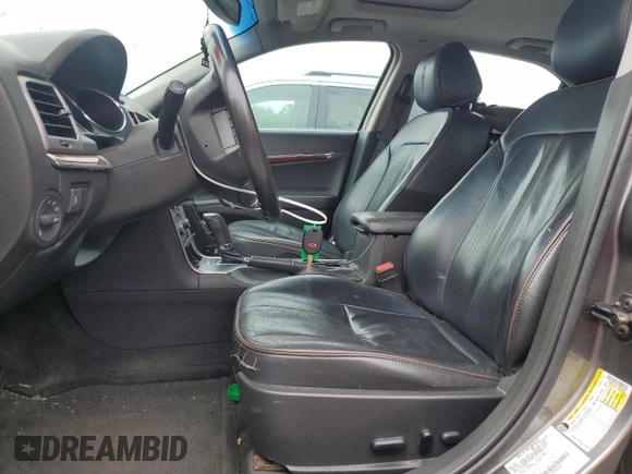 2012 Lincoln MKZ with VIN 3LNHL2JC1CR808663, listed as a Copart auction lot 61001675 with 153,627 mi miles and Salvage title. Bid and sale history available at DreamBid. Image 7.
