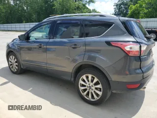 2018 Ford Escape Titanium with VIN 1FMCU0J93JUB20136, listed as a Copart auction lot 56841065 with 129,954 mi miles and Salvage title. Bid and sale history available at DreamBid. Image 2.