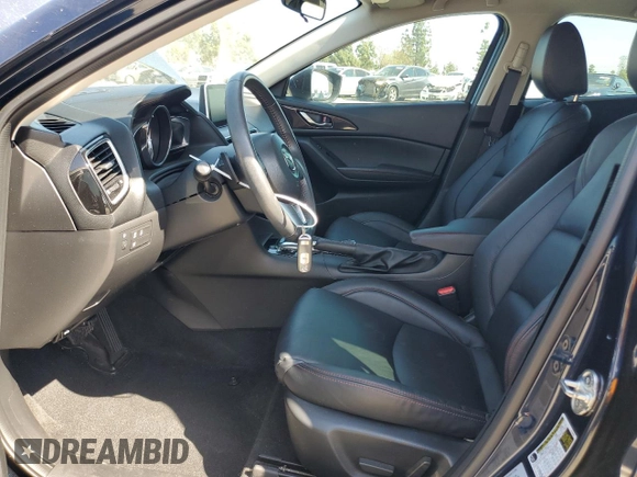 2014 Mazda 3 S Touring with VIN JM1BM1L31E1162990, listed as a Copart auction lot 51667034 with 92,255 mi miles and Salvage Title. Bid and sale history available at DreamBid. Image 7.