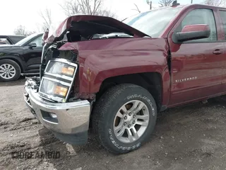 2015 Chevrolet Silverado 1500 LT with VIN 1GCVKREC5FZ151119, listed as a IAAI auction lot 41904778 with 122,209 mi miles and . Bid and sale history available at DreamBid. Image 6.