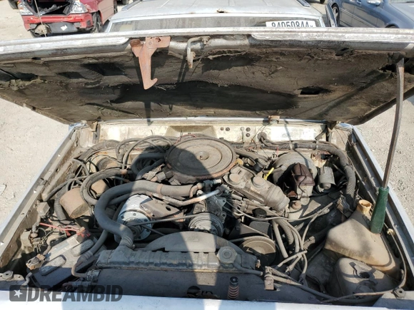 1985 Jeep Cherokee с VIN 1JCWB7742FT144063, выставлен на аукционе Copart как лот 84050844 с пробегом 80 072 миль миль и Чистый • Clean title. История ставок и продаж доступна на DreamBid. Изображение 11.