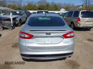 2014 Ford Fusion Titanium Hybrid with VIN 3FA6P0RU9ER147443, listed as a IAAI auction lot 41739540 with 146,359 mi miles. Bid and sale history available at carsss.com. Image 17.