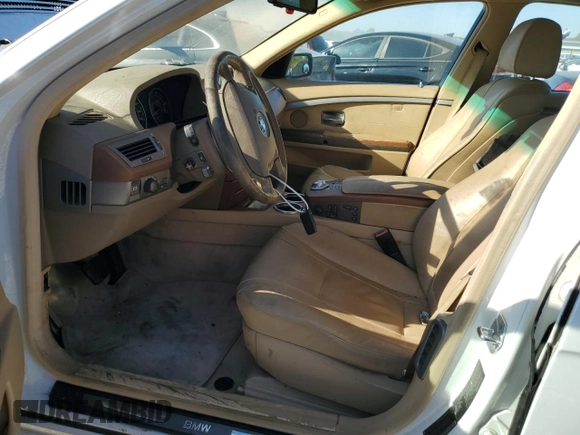 2004 BMW 7 Series 745i with VIN WBAGL63484DP68795, listed as a Copart auction lot 77201084 with 134,044 mi miles and Salvage Title. Bid and sale history available at DreamBid. Image 7.