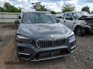 2016 BMW X1 xDrive28i z VIN WBXHT3C31GP881961, wystawiony jako Copart lot #56494955 z przebiegiem Nie podano mil oraz Tytuł czysty. Historia ofert i sprzedaży dostępna na DreamBid. Obrazek 5.