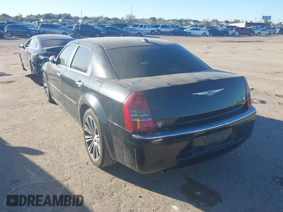 2006 Chrysler 300 C with VIN 2C3LA63H56H246663, listed as a IAAI auction lot 40894432 with 145,629 mi miles. Bid and sale history available at carsss.com. Image 3.
