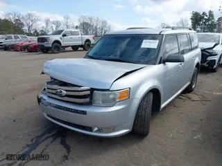 2011 Ford Flex SE with VIN 2FMGK5BC6BBD28887, listed as a IAAI auction lot 41726722 with 139,000 mi miles. Bid and sale history available at carsss.com. Image 2.
