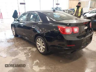 2013 Chevrolet Malibu LTZ with VIN 1G11H5SA1DU129095, listed as a IAAI auction lot 41556006 with 170,477 mi miles and . Bid and sale history available at DreamBid. Image 3.