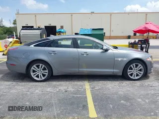 2013 Jaguar XJ with VIN SAJWJ1CD4D8V46305, listed as a IAAI auction lot 42637329 with 101,532 mi miles and . Bid and sale history available at DreamBid. Image 13.