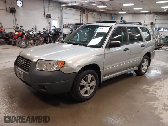 2006 Subaru Forester 2.5 X with VIN JF1SG636X6H712880, listed as a IAAI auction lot 40062211 with 127,537 mi miles. Bid and sale history available at carsss.com. Image 2.