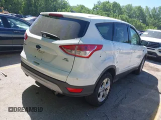 2016 Ford Escape SE z VIN 1FMCU9GX1GUC67851, wystawiony jako IAAI lot #42283011 z przebiegiem 134 458 mil mil oraz . Historia ofert i sprzedaży dostępna na DreamBid. Obrazek 4.