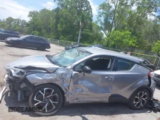 2018 Toyota C-HR XLE with VIN JTNKHMBX7J1009692, listed as a IAAI auction lot 42390685 with 77,866 mi miles and . Bid and sale history available at DreamBid. Image 15.