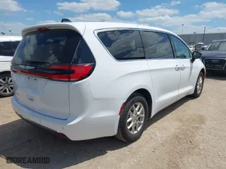 2024 Chrysler Pacifica Touring L with VIN 2C4RC1BG0RR151258, listed as a IAAI auction lot 42040280 with 35,919 mi miles. Bid and sale history available at carsss.com. Image 4.