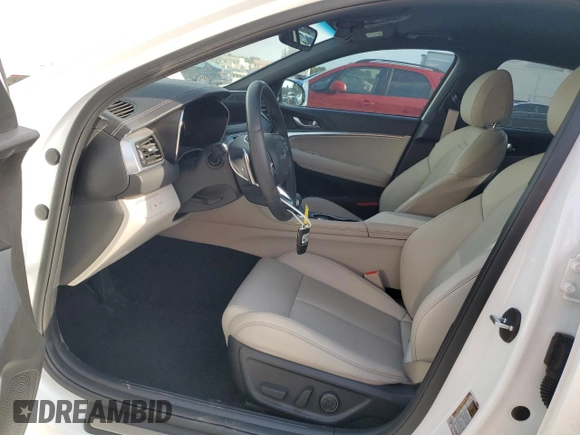 2023 Genesis G70 2.0T z VIN KMTG34TA0PU134125, wystawiony jako Copart lot #52253545 z przebiegiem 11 077 mil mil oraz Szkoda całkowita • Salvage title. Historia ofert i sprzedaży dostępna na DreamBid. Obrazek 7.