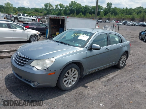 2010 Chrysler Sebring Limited with VIN 1C3CC5FDXAN161928, listed as a IAAI auction lot 42762581 with 182,795 mi miles and . Bid and sale history available at DreamBid. Image 2.