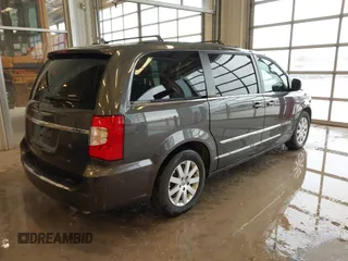 2016 Chrysler Town & Country Touring with VIN 2C4RC1BG9GR222339, listed as a IAAI auction lot 41580617 with 80,795 mi miles and . Bid and sale history available at carsss.com. Image 4.