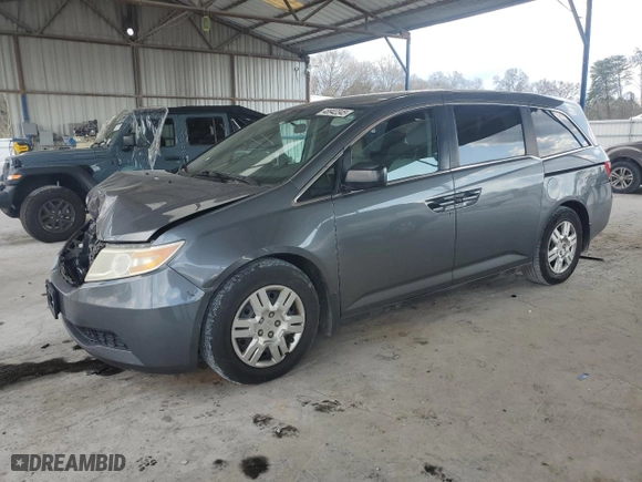 2012 Honda Odyssey LX with VIN 5FNRL5H27CB114813, listed as a Copart auction lot 48942345 with 204,061 mi miles and Salvage Title. Bid and sale history available at carsss.com. Image 1.