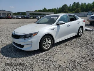 2016 Kia Optima LX z VIN 5XXGT4L38GG030133, wystawiony jako Copart lot #59385105 z przebiegiem 130 546 mil mil oraz Czysty tytuł • Clean title. Historia ofert i sprzedaży dostępna na DreamBid. Obrazek 1.