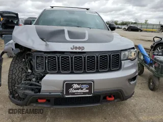 2018 Jeep Grand Cherokee Trailhawk with VIN 1C4RJFLG8JC164774, listed as a Copart auction lot 51699845 with 104,467 mi miles and Salvage title. Bid and sale history available at DreamBid. Image 5.