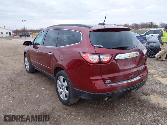 2016 Chevrolet Traverse LTZ z VIN 1GNKVJKD8GJ167038, wystawiony jako IAAI lot #41878254 z przebiegiem 159 771 mil mil oraz . Historia ofert i sprzedaży dostępna na DreamBid. Obrazek 3.