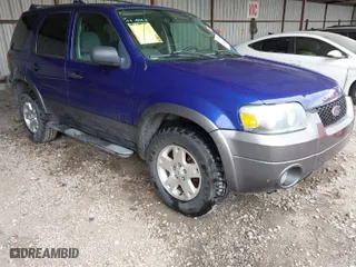 2006 Ford Escape XLT with VIN 1FMYU03166KC05651, listed as a IAAI auction lot 41799174 with 114,594 mi miles. Bid and sale history available at carsss.com. Image 1.