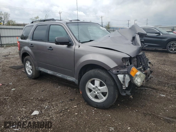 2010 Ford Escape XLT с VIN 1FMCU9D70AKD14536, выставлен на аукционе Copart как лот 54414855 с пробегом Не указан миль и Списание • Salvage title. История ставок и продаж доступна на DreamBid. Изображение 4.