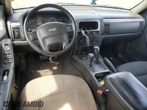 2004 Jeep Grand Cherokee Laredo with VIN 1J4GW48S64C291404, listed as a Copart auction lot 62835335 with 170,365 mi miles and Salvage title. Bid and sale history available at DreamBid. Image 8.