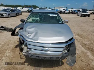2012 Ford Fusion SE z VIN 3FAHP0HG8CR145183, wystawiony jako Copart lot #58627705 z przebiegiem 236 148 mil mil oraz Szkoda całkowita • Salvage title. Historia ofert i sprzedaży dostępna na DreamBid. Obrazek 5.