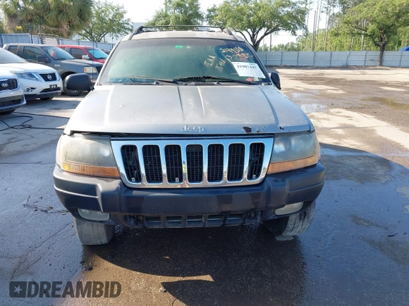 2000 Jeep Grand Cherokee Laredo z VIN 1J4GW48S8YC244168, wystawiony jako IAAI lot #41907447 z przebiegiem 243 154 mil mil oraz . Historia ofert i sprzedaży dostępna na DreamBid. Obrazek 6.