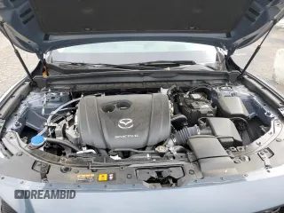 2023 Mazda CX-50 S Premium Plus z VIN 7MMVABEMXPN102316, wystawiony jako Copart lot #60009812 z przebiegiem 4 876 mil mil oraz . Historia ofert i sprzedaży dostępna na DreamBid. Obrazek 7.