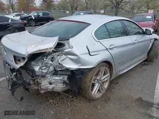 2013 BMW 6 Series 650i xDrive with VIN WBA6B4C53DD098486, listed as a IAAI auction lot 42038491 with 97,771 mi miles. Bid and sale history available at carsss.com. Image 4.