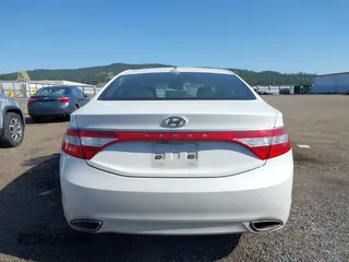 2014 Hyundai Azera with VIN KMHFG4JGXEA345249, listed as a IAAI auction lot 42118221 with 66,567 mi miles and . Bid and sale history available at carsss.com. Image 17.