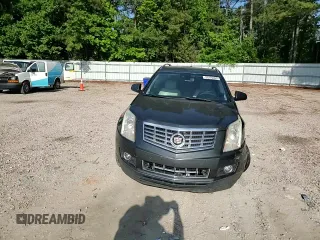 2016 Cadillac SRX Performance Collection z VIN 3GYFNCE30GS572828, wystawiony jako Copart lot #55176485 z przebiegiem 108 767 mil mil oraz Szkoda całkowita • Salvage title. Historia ofert i sprzedaży dostępna na DreamBid. Obrazek 13.