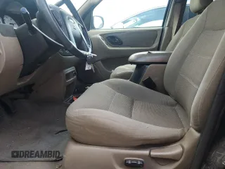 2002 Ford Escape XLT Choice z VIN 1FMYU04172KA54070, wystawiony jako Copart lot #60696405 z przebiegiem 311 796 mil mil oraz Czysty tytuł • Clean title. Historia ofert i sprzedaży dostępna na DreamBid. Obrazek 7.