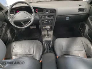 1990 Nissan Maxima z VIN JN1HJ01PXLT401797, wystawiony jako Copart lot #47868945 z przebiegiem Nie podano mil oraz Szkody całkowita. Historia ofert i sprzedaży dostępna na DreamBid. Obrazek 8.