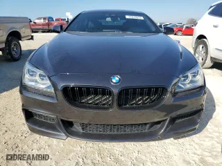 2015 BMW 6 Series 650i with VIN WBA6B2C58FD799063, listed as a Copart auction lot 77819914 with 0 mi miles and Salvage Title. Bid and sale history available at carsss.com. Image 5.