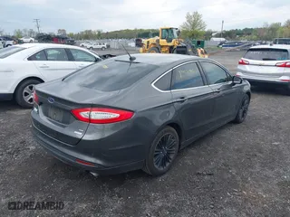 2016 Ford Fusion SE with VIN 3FA6P0HD4GR169113, listed as a IAAI auction lot 42037905 with 105,316 mi miles. Bid and sale history available at carsss.com. Image 4.