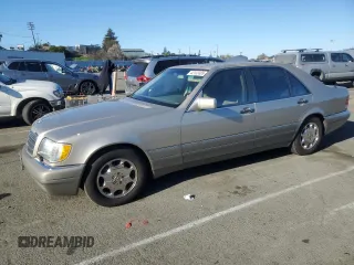 1995 Mercedes-Benz S with VIN WDBGA51E4SA202452, listed as a Copart auction lot 42133385 with 165,561 mi miles and Clean Title. Bid and sale history available at DreamBid. Image 1.