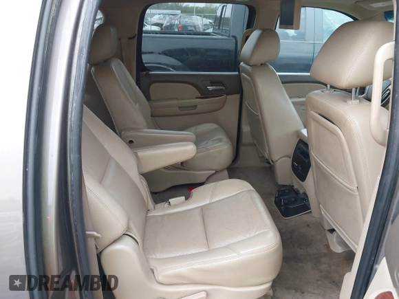2011 Chevrolet Suburban LTZ with VIN 1GNSKKE32BR197356, listed as a IAAI auction lot 42052377 with 248,574 mi miles and . Bid and sale history available at DreamBid. Image 8.