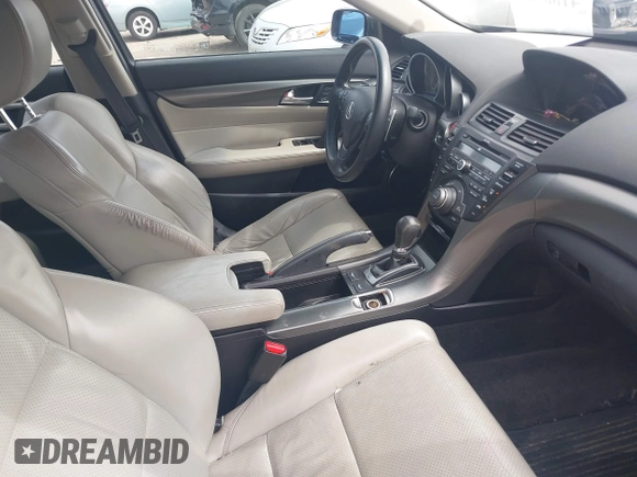 2012 Acura TL Tech Auto with VIN 19UUA9F59CA006501, listed as a IAAI auction lot 41869204 with 135,780 mi miles. Bid and sale history available at carsss.com. Image 5.