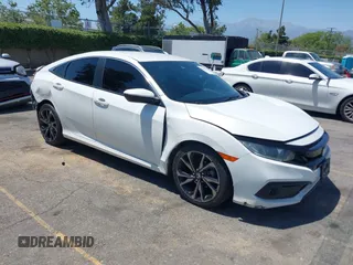 2019 Honda Civic Sport with VIN 2HGFC2F8XKH605556, listed as a IAAI auction lot 42301058 with 85,134 mi miles and . Bid and sale history available at DreamBid. Image 1.