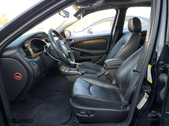 2006 Jaguar X-Type with VIN SAJWA51AX6WE88640, listed as a Copart auction lot 69043844 with 180,220 mi miles and Salvage Title. Bid and sale history available at carsss.com. Image 7.