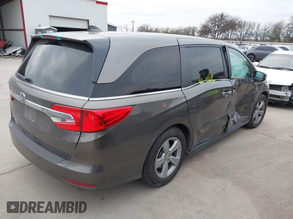 2018 Honda Odyssey EX-L with VIN 5FNRL6H75JB044789, listed as a IAAI auction lot 41625002 with 58,033 mi miles and . Bid and sale history available at DreamBid. Image 4.