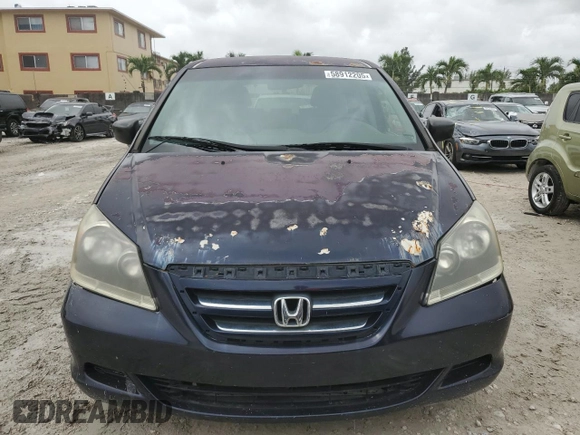 2007 Honda Odyssey LX with VIN 5FNRL382X7B054326, listed as a Copart auction lot 58912205 with 168,994 mi miles and Clean title. Bid and sale history available at DreamBid. Image 5.