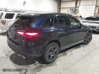 2023 Mercedes-Benz GLC with VIN W1NKM4HB9PF028986, listed as a IAAI auction lot 41611041 with 22,617 mi miles. Bid and sale history available at carsss.com. Image 4.