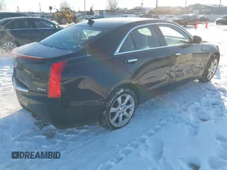 2014 Cadillac ATS Standard AWD with VIN 1G6AG5RX1E0170228, listed as a IAAI auction lot 41629063 with 89,568 mi miles and . Bid and sale history available at DreamBid. Image 4.